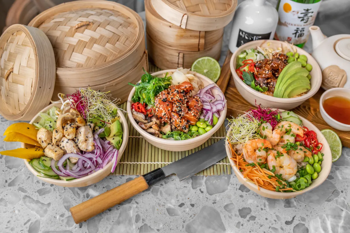Poke bowls with chicken, salmon and shrimp